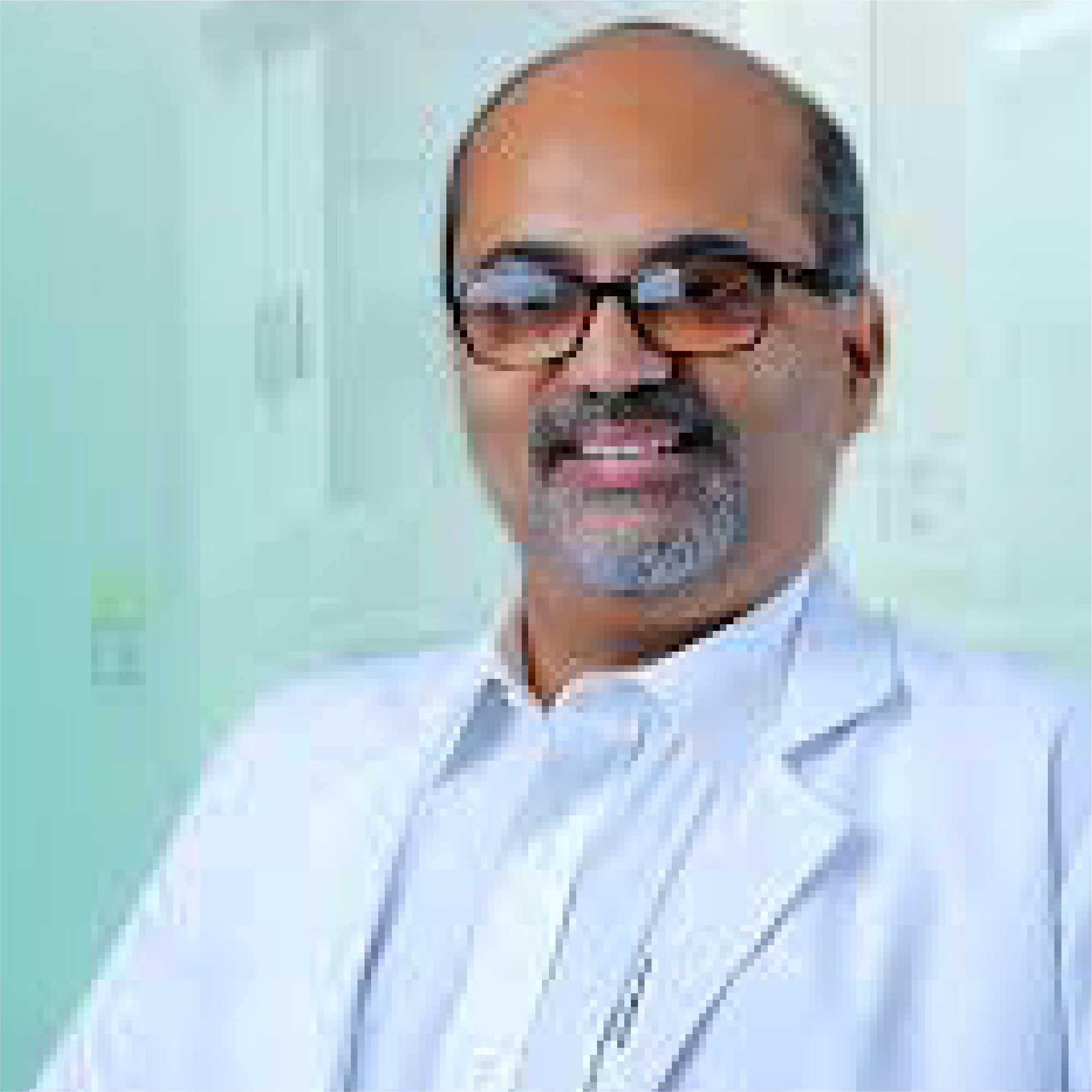 Dr. Johnny Kannampilly